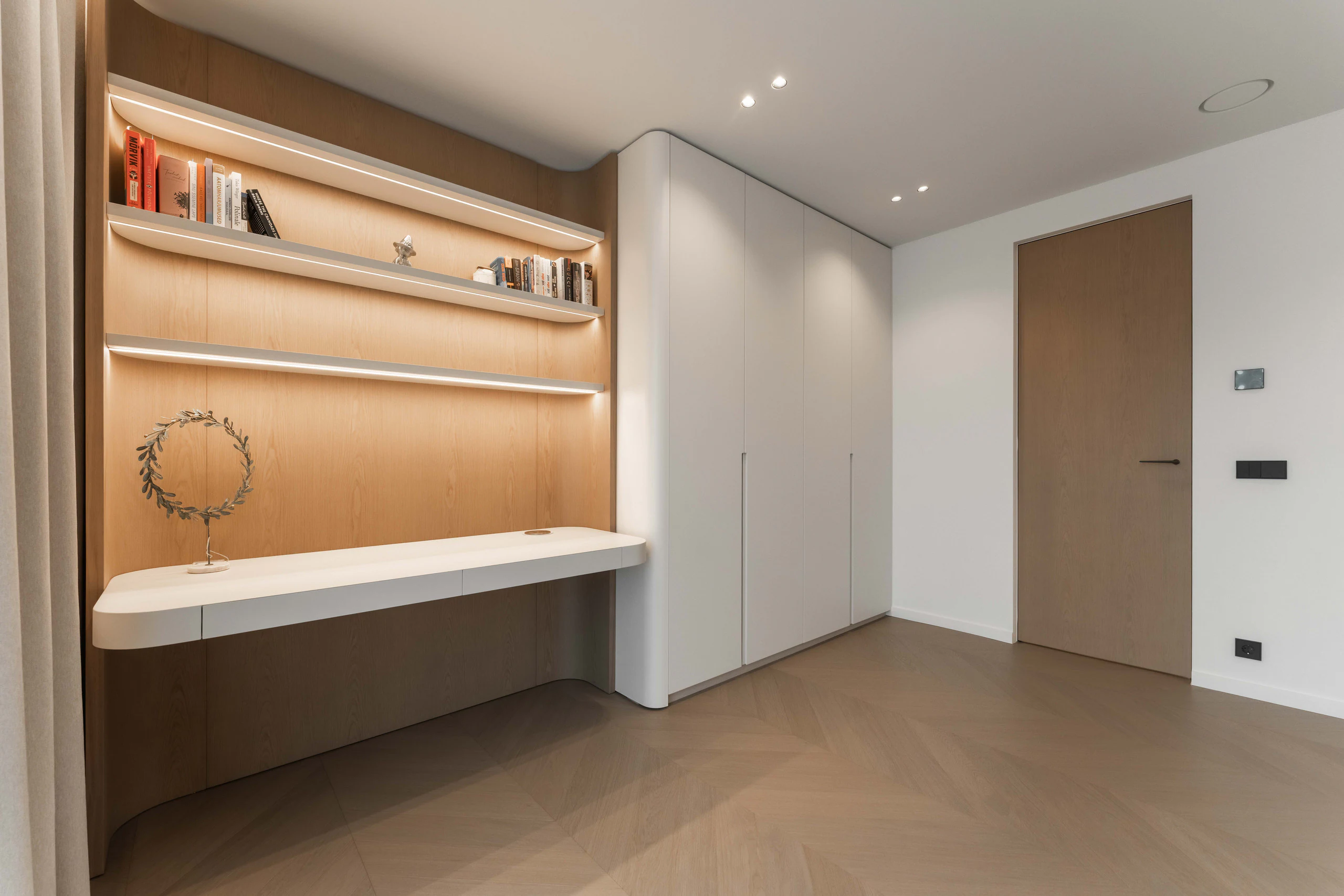 Integrated study furniture, illuminated shelving and concealed storage